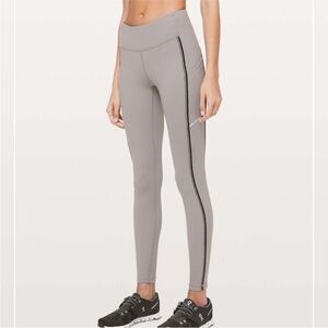 Lululemon Women's Size 4 Speed Up Reflective  Metallic Leggings Grey Pockets